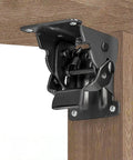 Close-up of a Self Locking Folding Table Leg Bracket with Heavy Duty Hinge mounted on wood, ideal for collapsible shelves and wall mounts.