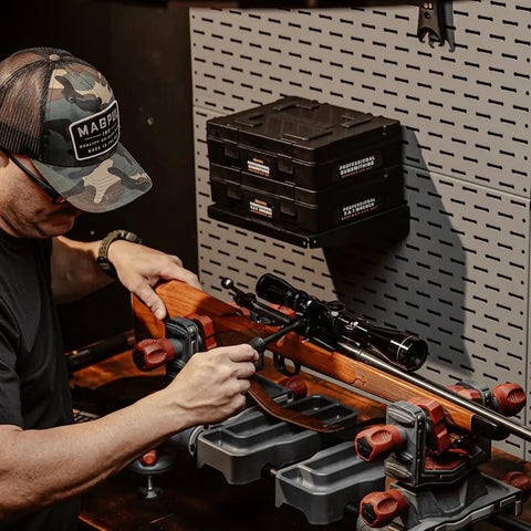 Man using Space Saver Magnetic Screwdriver Set With Hollow Handle, Bit Kit, And Compact Storage Case for gun care
