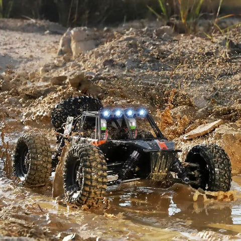 1-12 Scale All Terrain RC Truck With 4x4 Drive High Speed 38 Km/h Remote Control Car driving through muddy terrain