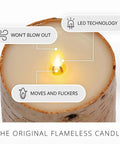 Birch Bark Wrapped Flameless LED Candle With Moving Flame, Battery Operated 3.5 By 4.5 Inch Pillar Light showing flickering flame