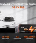 58.4V 18A LiFePO4 Battery Charger For 48V Systems, mounted on a wall, connected to a 51.2V 60Ah battery, showing charge status.