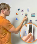 Man using Magnetic Paint And Primer Water Based 32 Oz Black for Walls and Surfaces Lets You Attach Magnets to Photos Posters Artwork