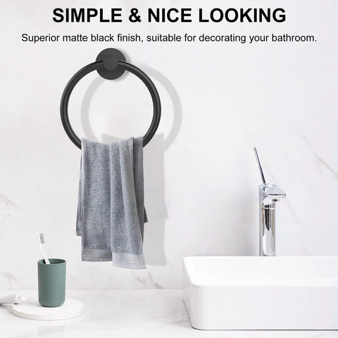 Matte Black Wall Towel Holder And Ring - Stainless Steel Heavy Duty Hand Towel Bar in a bathroom setting with towel hanging