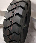 Built Tough 6.00x9 Forklift Tires Shop Ready Kit With Inner Tube And Reinforced Flap close-up showing durable tread pattern for grip.