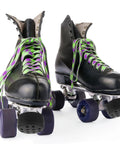 Black quad skates with green laces featuring Roller Skate Toe Stops And Brake Blocks For Outdoor Quad Skating, shown from front angle.
