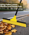 Heavy Duty Push Broom With 60 Inch Long Handle And 18 Inch Stiff Bristle Head For Floor Cleaning Indoors Outdoors in use on leaves