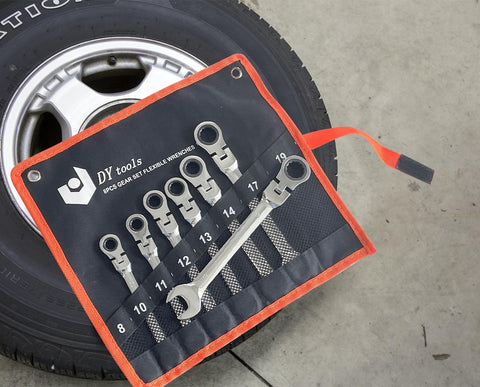 8 Piece Flex Head Ratcheting Wrench Set With 8 To 19 Millimeter Metric Chrome Vanadium Steel Wrenches, Gear Ring Ratchets, in pouch on concrete