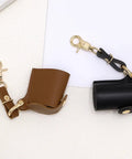 Brown and black Compact Water Film Holder Case With Keychain Clip And Quick View Waterproof Film Storage Bag shown on white background.