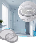 Amaxiu 2Pcs Shower Drain Hair Catcher, 3.54in/5.7in Shower Drain Cover in a modern bathroom with wet floor.