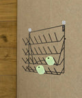 Hella Durable Wall Mount Display Rack Two Pack Iron Hanging Storage Organizer For Mugs Glasses And Home Decor Space Saving Black Rack displaying hanging items.