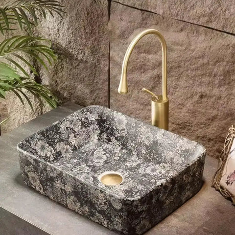 UMJIGF Vessel Sink Outdoor Courtyard Retro Ceramic Table Basin Wash Basin with floral design and gold faucet.