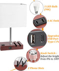 Diagram of fully dimmable bedside lamp with USB charging station and built-in outlet, features bulb, ports, and phone slots.