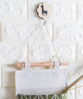 Over Door Hanging Shoe Organizer Bag crafted from soft cotton linen, showcasing hooks and storage pockets for smart bedroom solutions.