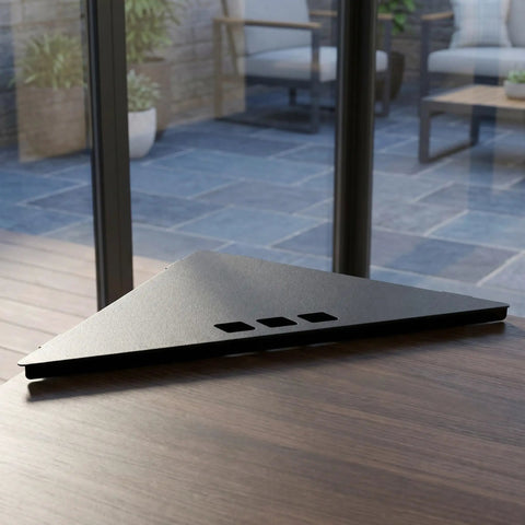 Black stainless steel 90-degree folding table corner bracket on wooden outdoor table for camping setup