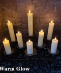 Ivory Flameless Pillar Candles Set of 9 With Remote Control Real Wax Look flickering LED flames on dark rocks