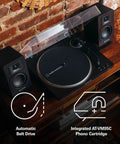 Audio Technica At-Lp70x Fully Automatic Belt Drive Turntable With Switchable Phono Preamp And At-Vm95c Cartridge showcasing sleek black finish on a wooden shelf.