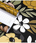 Black Vintage Floral Peel And Stick Wallpaper With Daisy Flowers And Olive Green Leaves For Powder Rooms And Moody Accent Walls Removable Vinyl Contact Paper 17.7in By 32.8ft close-up view