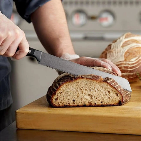 Pro CBN Grinding Wheel For Sharpening Bread Knife Serrations With Steel Adapter Arbor Reliable Rotary Tool Fit For Fast Kitchen Chopping And Sharp As A Tack Edges All Day Long, slicing sourdough bread with a serrated knife.