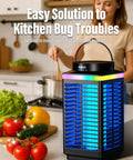 Outdoor Cordless Mosquito Zapper With 4200V Electric Grid next to vegetables on a kitchen counter