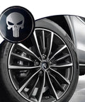 Badass American Flag Wheel Hub Cap Kit 4 Pack Slick Metal Center Hub Covers on a stylish truck wheel with black skull design.