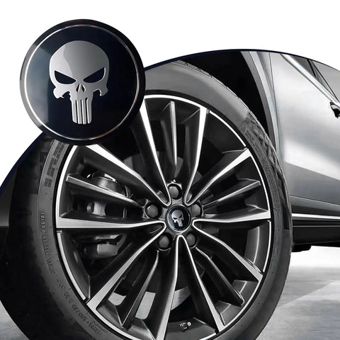 Badass American Flag Wheel Hub Cap Kit 4 Pack Slick Metal Center Hub Covers on a stylish truck wheel with black skull design.