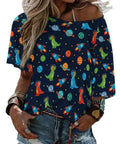Space Dragon Galaxy Print Tee with boat neck, loose fit short sleeve, colorful dinosaurs, planets, and stars design