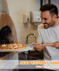 ALLTOP metal pizza peel with wooden turning handle 12x14 in for sliding pizza into a brick oven.