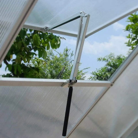 Open vent showing Solar Heat-Sensitive Automatic Greenhouse Vent Opener Kit With Single Spring installed on greenhouse roof.