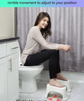 Woman using 7 Inch Toilet Stool With Split Two Piece Movable Foot Rests Go To Stackable Space Saving Squatting Aid For Adults White