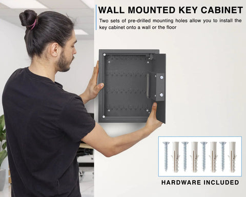 Person installing 40 Key Cabinet With Digital Lock Key Safe for Office and Valet Use, heavy duty 16-gauge steel, wall-mounted open door
