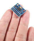 Close-up of GY 291 3 Axis Accelerometer Module with I2C and SPI for Arduino ADXL345 Digital Tilt Sensor in hand