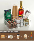 Clear Acrylic Coffee Station Organizer For Countertop And Office Breakroom Keeps K Cup Pods Condiments Sugar Creamers Syrups Tea Bags And More Neatly Accessible A Tidy Coffee Bar Essential And Gift For Coffee Lovers holding coffee supplies.