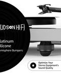 Pro Grade Vibration Isolation Feet For Studio Speakers And Stereo Gear Featuring Ultra Soft Platinum Silicone Hemispheres on a turntable.