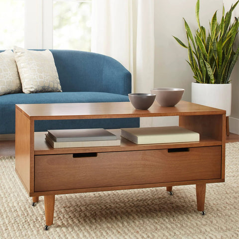 Swivel Stem Caster One Inch Wheel Zinc Alloy With Socket Replacement For Coffee Tables Chests Of Drawers Nightstands And Ottomans 360 Lb Load Capacity Elevates By About One Point Three Inches Wheel Diameter One Inch Stem Diameter Three Eighths Inch installed on a wooden coffee table.