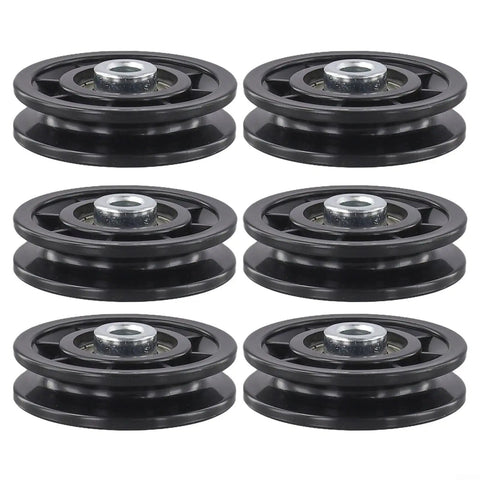 Six Piece Pulley Wheel Set For Home Gym And Cable Machines With Smooth Nylon Rollers And Steel Bearings In 70mm And 90mm Sizes, Quiet Durable Gear For Strength Training And Fitness Upgrades. Six black pulley wheels