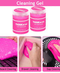 Pink Car Interior Detailing Kit With 17 Piece Pro Grade Brush Set including cleaning gel shown on keyboard, drawer, fan blades.