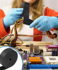 Person using 1 Inch Heat Shrink Tape For Electrical Wiring Black Shrink Wrap Tape With Heat Activated Adhesive That Melts And Seals