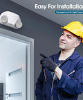 Installer pointing at LED Emergency Light With Remote Capable And Adjustable Lamp Heads For Exit Lighting, Backup Battery Power, 120V-277V Dual Voltage