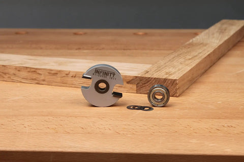 Divided Light Door Kit With Rail And Stile Bits Set Carbide Tip Heavy Duty Router Bits and wood piece on a workbench