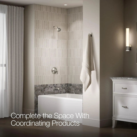 Bathroom interior featuring Matte Black Tub And Shower Faucet With Rite Temp Technology over a white bathtub.