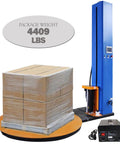 Workhorse Industrial Pallet Wrapping Machine With 4409 Pounds Capacity And 65 Inch Turntable featuring a large load of boxes wrapped in plastic.