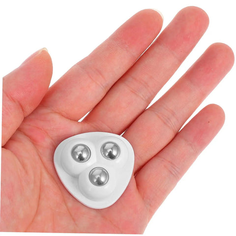 Eight Piece Stainless Steel Self Adhesive Caster Wheels With Smooth Ball Bearings For Effortless Furniture Relocation And Heavy Duty Storage Box Glide Conversion Today held in hand.