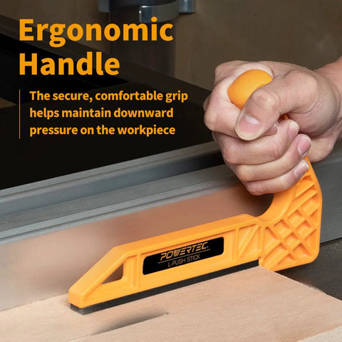 Close-up of Dual Grip L Shaped Push Sticks To Keep Your Digits Safe During Hard Woodworking Jobs Smooth Guide Tool For Table Saw Router And Band Saw Cutting Keeps Hands Protected While You Kick Up Sawdust In The Shop with ergonomic handle in use.