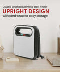 Upright Go-To Panini Maker Grill Press For Quick Grilled Cheese And More 2 Slice, 750 Watt Stainless Steel on a countertop.