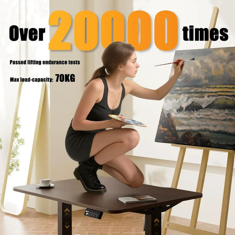 Woman painting on Electric Standing Desk Lifts Adjustable Height From 18.9 To 29.5 Inches With Lockable Wheels And Smooth Motor For Home Office Ergonomic Computer Desk Setup Easy One Touch Control.