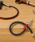 Ultimate European Cylinder Pressure Hose For Vehicle Engine Leak Testing Air Holder Pipe And Cylinder Test Line Good For Garage Diagnostic Leak Detection So You Can Fix Engine Right Away Without Breaking A Sweat Inside Garage. Black rubber hose with brass quick-connect fitting and red valve for engine leak testing