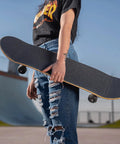 Grip Tape For Skateboards, Longboards And Scooters - Non Slip, Bubble Free Application, 110 X 27 Cm shown on skateboard outdoors