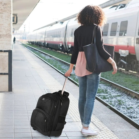 Woman at train station with Rolling Laptop Backpack With Wheels 17 Inch Water Resistant Carry On Luggage For Business Travel