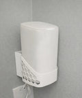 Wall Mount Bracket For Xfinity Comcast Xb8 Router Wifi mounted on a wall, keeping the router cool and tidy.
