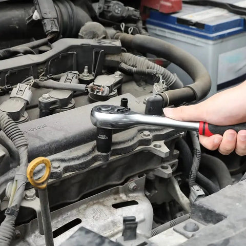 14 Piece One Half Inch Drive Shallow Impact Socket Set Metric 6 Point 11mm To 32mm in use on car engine with wrench